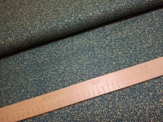 Zlatý prach na tmavě zelené