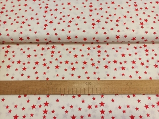 Červené hvězdičky na smetanové