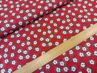 Bílé kvítky se šiškami na červené