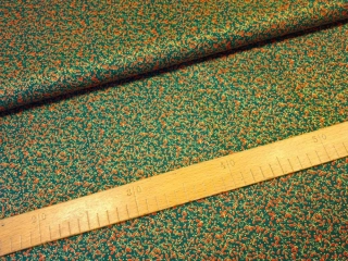 Červené větvičky se zlatem na tmavě zelené